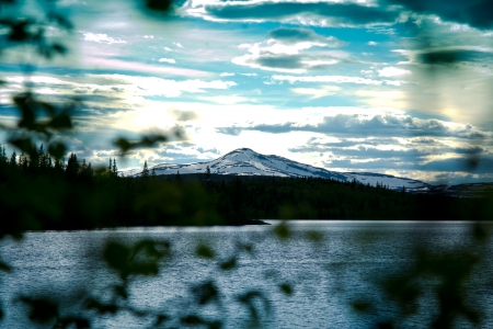 lake with mountains in the background and a beautiful skyの写真素材
