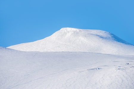 white beautiful mountain with a clear blue sky の写真素材
