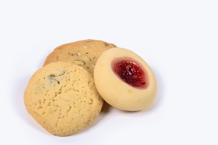 three homemade cookies on a white backgroundの写真素材