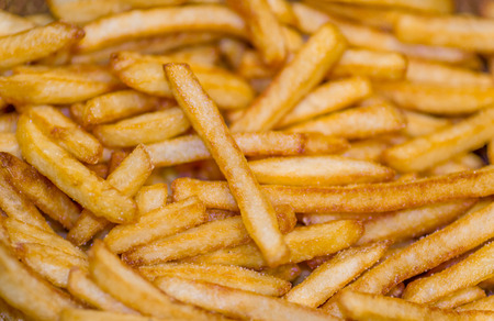 closeup of a pile of french friesの写真素材