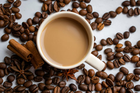 a cup of coffee on the table top view, coffee beans background