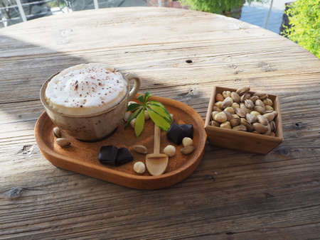 Cappuccino with chocolate and hazelnutの写真素材