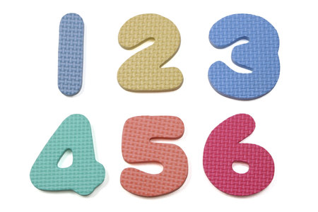 Colorful foam numbers one to six on a white background