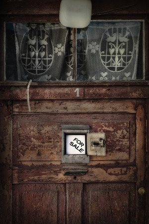 Ruined door of  abandoned house.の写真素材