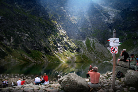 Zakopane, Poland - August 17, 2011:  Unidentified people visiting  Black Lake below Mount Rysy - the highest peak in the Tatra Mountains.のeditorial素材