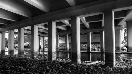 Grunge urban scene under automotive bridge.の写真素材