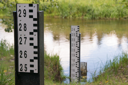 Three water level measurement gauges used to monitor the water levels.の写真素材