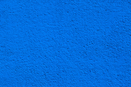 Cement or plaster wall. Blue background.の写真素材