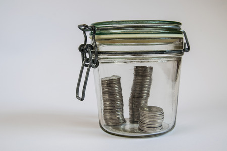 Money stored in a sealed retro  jar.の写真素材