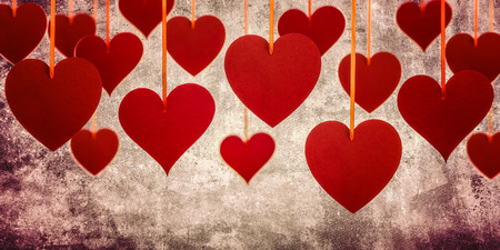 Red hearts on the grunge background. Valentine's Day composition.の写真素材