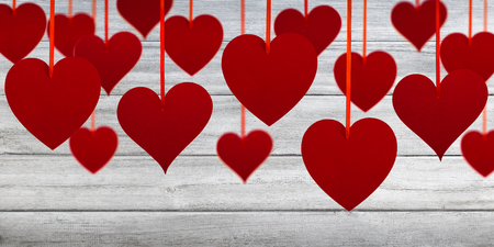 Red hearts on gray planks. Valentine's Day background.の写真素材
