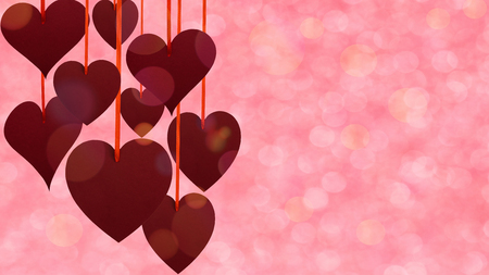 Valentine's day upper decoration with hanging hearts on defocused background.の写真素材