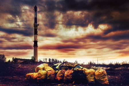 Environmental pollution. Litter, dirty air,  industry cause ecological problem.の写真素材