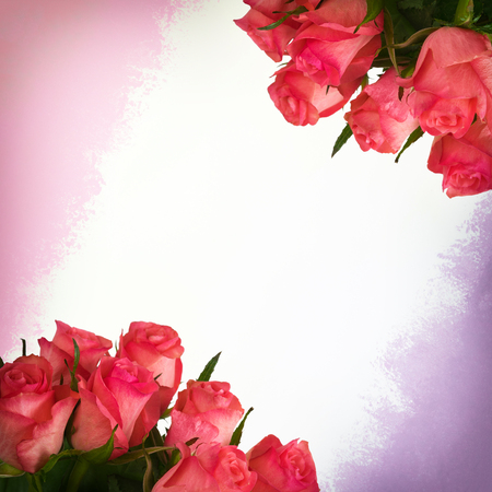 Rhombus decoration made of pink roses and painted frame on white.の写真素材