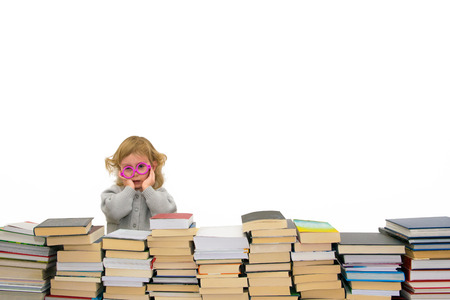 Three year old girl in pink glasses worried excess lessons. Isolated on white.の写真素材