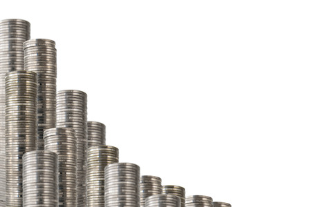 Rows of coin stacks isolated on white. Backslash  decoration with money.の写真素材