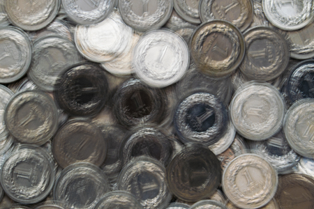 One polish zloty blurred underwater background.の写真素材