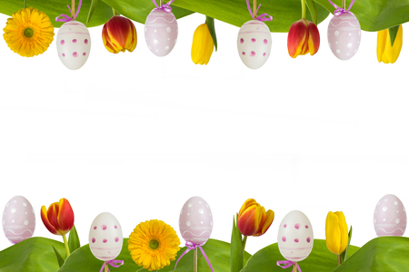 Easter frame  with  eggs and colorful flowers on white background.の写真素材