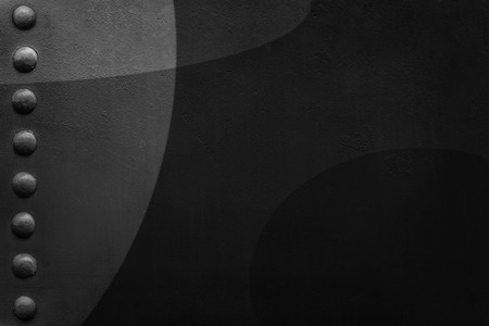 Riveted industrial  plate with circles. Metal background.の写真素材