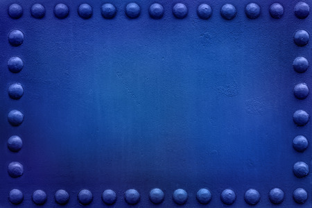Riveted military or industrial plate. Metal background.の写真素材