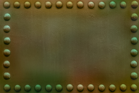 Riveted military or industrial plate. Metal background.の写真素材