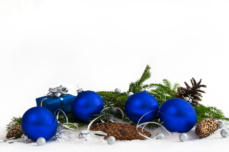 Christmas lower decoration with balls; stars; cones and gift on white background.の写真素材