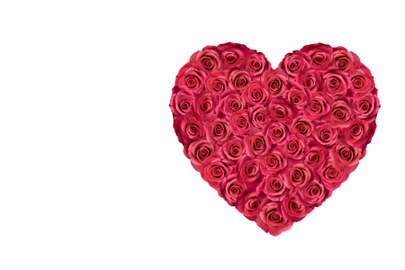 Heart filled with red roses isolated on white.の写真素材