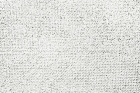 Cement or plaster wall. White background.の写真素材