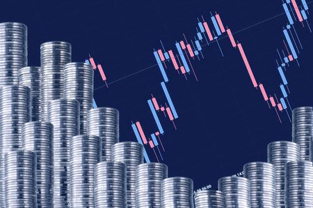 Rows of silver coins with a graph. Blue crossing.の写真素材
