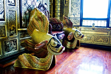 Thai fish carvings in hall of temple in Thailand のeditorial素材