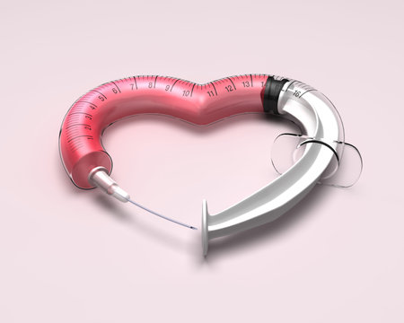 Syringe in the shape of heartの写真素材
