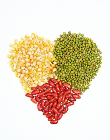 Raw seeds heart shape pattern concept editorialの写真素材