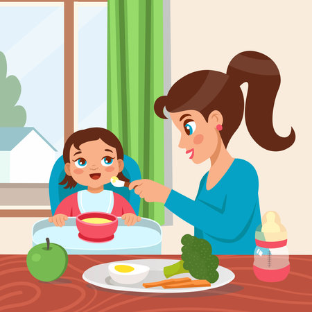 Mother feeds her baby with a spoon. Child learning to eat with a spoon. Feeding baby porridge sitting on a chair. Healthy eating, baby care. Cartoon style illustration.のイラスト素材