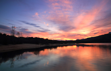 Beautiful sunset on Lake , Manzanares del Real , Spainの写真素材