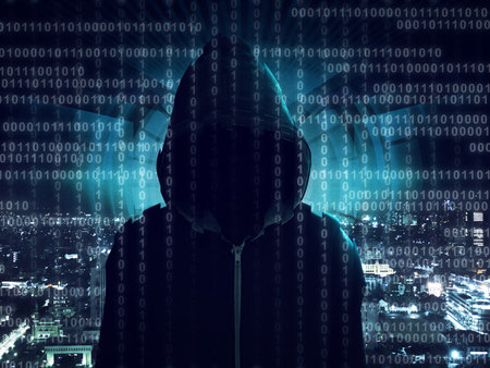 Young hacker in data security concept