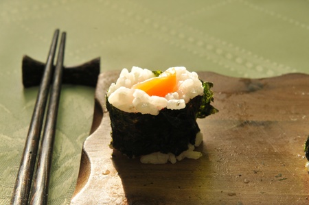 Roll in the restaurant lie on a wooden boardの写真素材