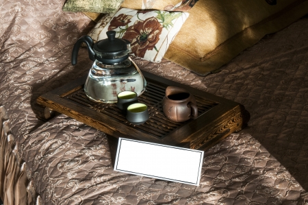 Tea ceremony on tea table with blank cardの写真素材