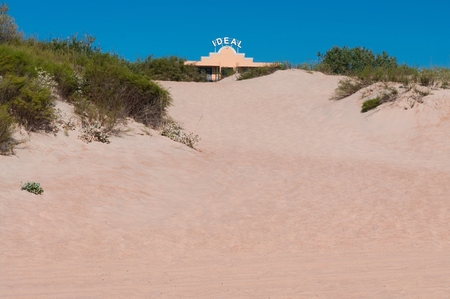Road in the sand between the sand hillsの写真素材