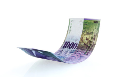 Flying Swiss money - the new issue of thousend francs note, isolated with clipping path