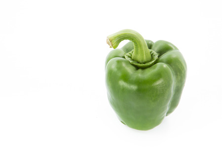 Green capsicum or sweet pepper isolated on white backgroundの写真素材
