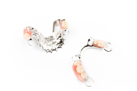 removable partial denture on white background.の写真素材