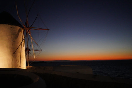 Sunset behind the windmills of Mykonos, Greeceの写真素材
