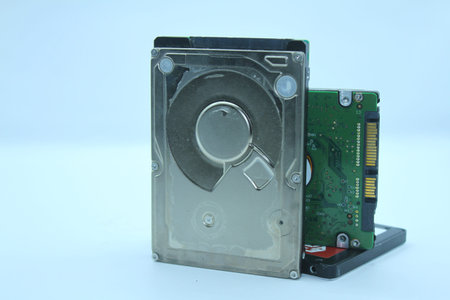 Hard disk drive isolated on a white background. Computer hardware technology.