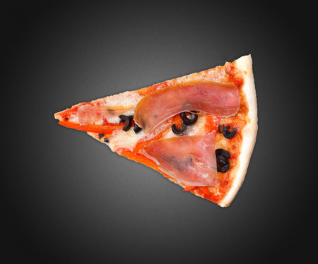 Delicious pizza on a dark backgroundの写真素材