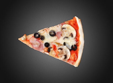 Delicious pizza on a dark backgroundの写真素材