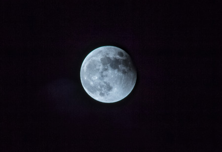 Dark sky and moonの写真素材