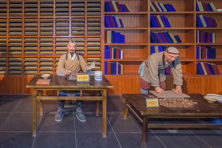 Xixia movable type printing process wax figureのeditorial素材