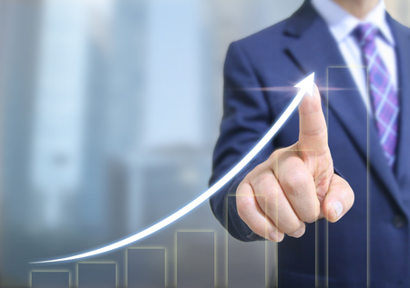 business man touch the graph screenの写真素材