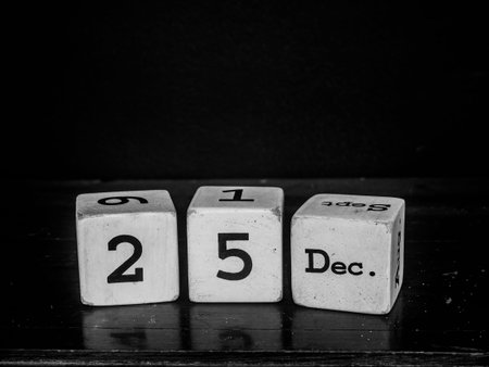 25 DEC.Merry christmas with white wooden cube calendar.black  whiteの写真素材