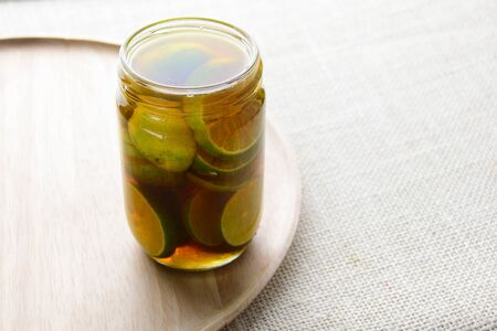 Lemon Honey, Place the lemon in the mason jar, alternating layers of each, A simple homemade cold and flu remedy.の写真素材